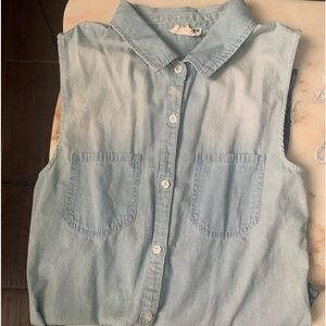 I am selling a cute sleeveless light blue semi plaid button down!!